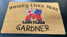 Load image into Gallery viewer, Lady Flags Outdoor Carpet &quot;Hockey Lives Here&quot;.
